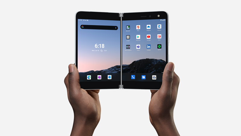 Surface Duo open and held in two hands